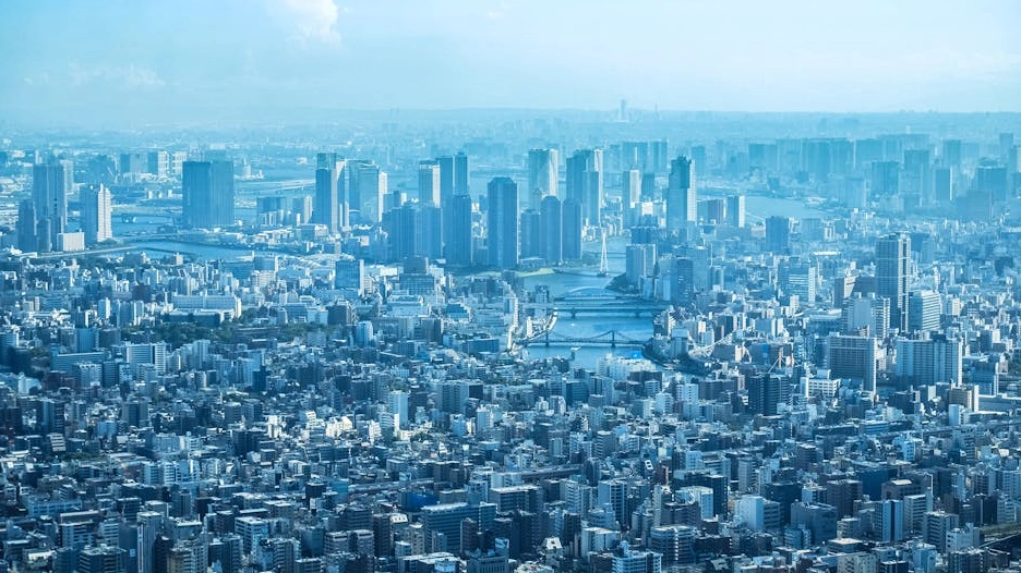 Dynamic aerial view of a global business city hub at dusk